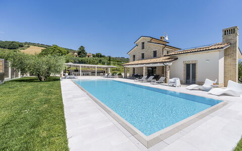 Villa Aso: Water, Sky, Plant, Building, Swimming Pool, Azure, Rectangle, Tree, House, Grass