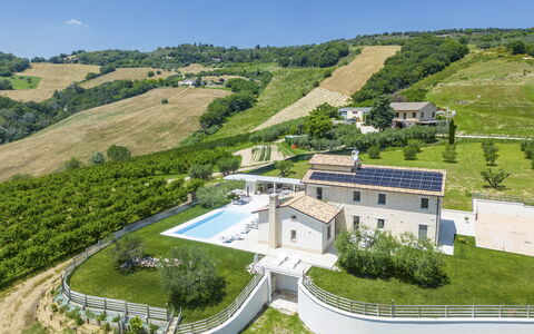 Villa Aso: Plant, Sky, Property, Slope, Land Lot, Building, Tree, Urban Design, Grass, Landscape