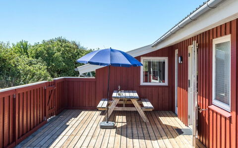 Kirsten - 800M from the Sea: Wood, Hardwood, Plank, Deck, Wood Stain, Wood Flooring, Shade, Chair, Outdoor Furniture, Balcony