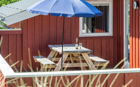 Kirsten - 800M from the Sea: Wood, Outdoor Furniture, Wood Stain, Shade, Hardwood, Siding, Chair, Porch, Outdoor Table, Cottage