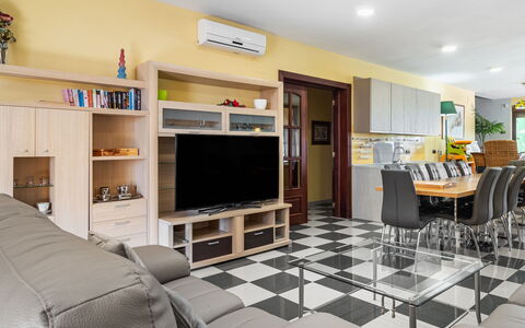 El Balcon: Furniture, Couch, Home Appliance, Living Room, Interior Design, Flooring, Shelf, Floor, Wood