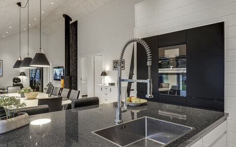 Jonne - 200M to the Fjord: Interior Design, Kitchen, Countertop, Flooring, Light Fixture, Ceiling, Natural Material, Glass, Cabinetry