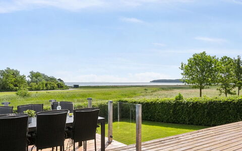 Nora - 100M from the Sea: Furniture, Interior Design, Flooring, Wood, Floor, Ceiling, Wood Flooring, Chair, Table, Lighting