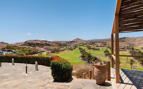 Vista Golf 22: Sky, Property, Furniture, Building, Table, Interior Design, Shade, Plant, Leisure, Condominium