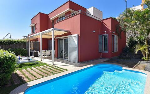 Vista Golf 22: Sky, Property, Furniture, Building, Table, Interior Design, Shade, Plant, Leisure, Condominium