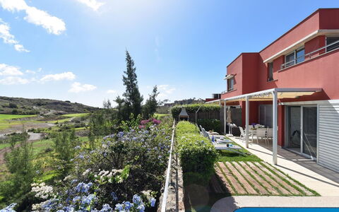 Vista Golf 22: Sky, Property, Furniture, Building, Table, Interior Design, Shade, Plant, Leisure, Condominium