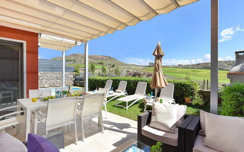 Vista Golf 22: Sky, Property, Furniture, Building, Table, Interior Design, Shade, Plant, Leisure, Condominium