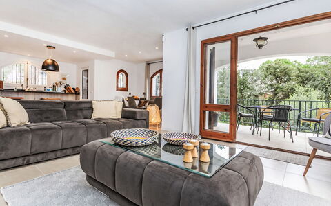 Gavarres: Furniture, Interior Design, Flooring, Couch, Floor, Wood, Room, Living Room, Table, Ceiling