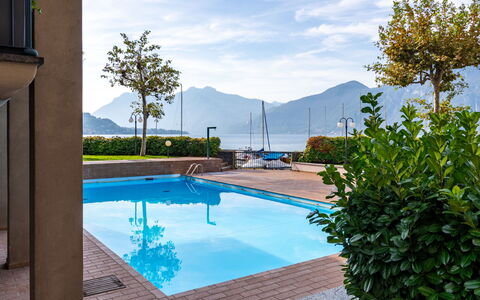 Punta Grumo 2: Sky, Building, Property, Table, Furniture, Cloud, Mountain, Interior Design, Outdoor Furniture, Wood