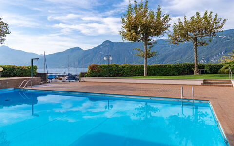 Punta Grumo 2: Sky, Building, Property, Table, Furniture, Cloud, Mountain, Interior Design, Outdoor Furniture, Wood