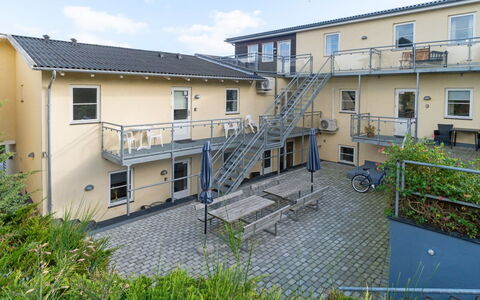 Caisa - 75M from the Sea: Furniture, Interior Design, Chair, Flooring, Table, Resort, Floor, Ceiling, Room, Eco Hotel