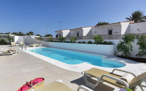 Velsuites 4: Sky, Property, Plant, Water, Swimming Pool, Building, Outdoor Furniture, Shade, Tree, Sunlounger