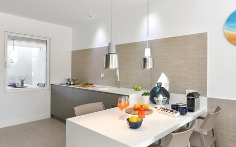 Velsuites 4: Table, Furniture, Cabinetry, Tableware, Orange, Lighting, Interior Design, Kitchen, Building, Wood