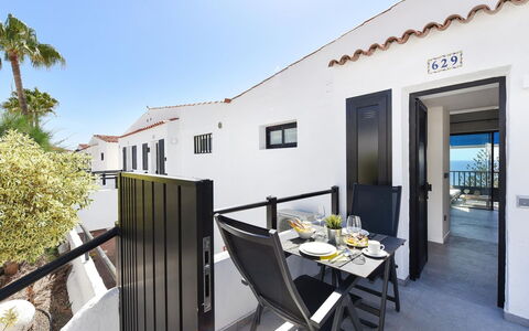 Los Canarios 629 - Adults Only: Water, Sky, Cloud, Property, Swimming Pool, Seaside Resort, Azure, Blue, Building, Outdoor Furniture