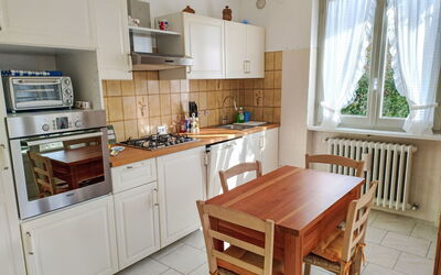 Roberto 110.1: Furniture, Kitchen Appliance, Kitchen, Flooring, Major Appliance, Countertop, Wood, Cabinetry, Interior Design, Floor