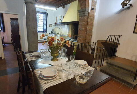 La Colonna: Table, Picture Frame, Furniture, Tableware, Chair, Building, Wood, Lighting, Dishware, Interior Design
