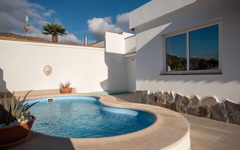 Sue: Water, Building, Property, Sky, Plant, Tree, Window, Leisure, Urban Design, Swimming Pool