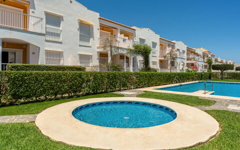 Sierra Mar: Water, Plant, Building, Sky, Property, Azure, Window, Tree, Grass, Urban Design