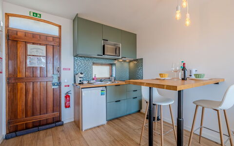 La Perle D'Albufeira: Furniture, Interior Design, Flooring, Wood, Floor, Kitchen, Countertop, Ceiling, Cabinetry, Room