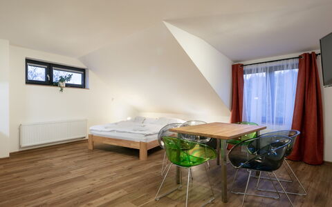 Janské Lázně 200: Table, Furniture, Building, Comfort, Wood, House, Couch, Flooring, Interior Design, Hall