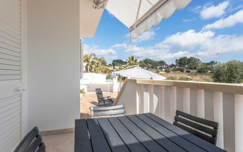 Marina di Pescoluse 651: Property, Sky, Furniture, Building, Cloud, Shade, Wood, Chair, House, Floor