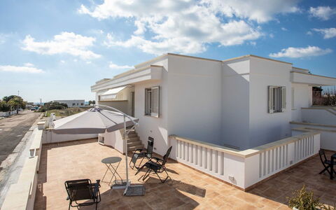 Marina di Pescoluse 651: Cloud, Sky, Building, Window, House, Shade, Urban Design, Residential Area, Real Estate, Landscape