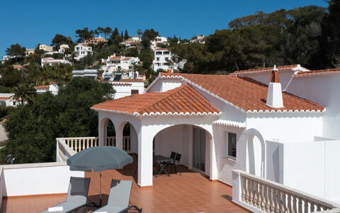 Son Bou Sunset 49: Sky, Water, Building, Property, Plant, Azure, Swimming Pool, Cloud, Leisure, Window