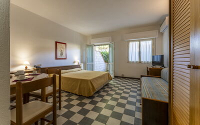 Giannella Beach Residence Apartment Mono 2: Furniture, Table, Picture Frame, Wood, Flooring, Floor, Houseplant, Living Room, Window