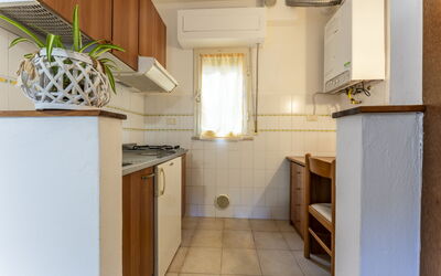 Giannella Beach Residence Apartment Bilo 3: Property, Cabinetry, Countertop, Building, Wood, Interior Design, Window, Kitchen, Flooring, Floor