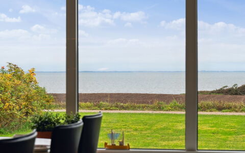 Luchia - 200M to the Fjord: Furniture, Sea, Interior Design, Ocean, Chair, Glass, Sunlight, Coast, Eco Hotel, Hardwood