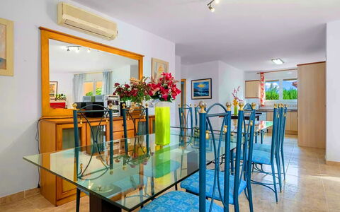 Villa Manuela: Table, Furniture, Property, Picture Frame, Chair, Lighting, Flowerpot, Interior Design, Houseplant, Floor