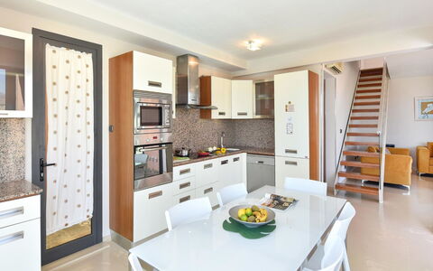 Los Lagos 36: Table, Cabinetry, Furniture, Countertop, Interior Design, Wood, Shelving, Home Appliance, Flooring, Living Room