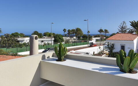 Velsuites 1: Sky, Plant, Shade, Tree, Building, Arecales, Urban Design, Street Light, Outdoor Furniture, House