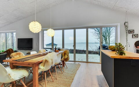 Lika - 25M to the Fjord: Furniture, Couch, Interior Design, Flooring, Living Room, Floor, Throw Pillow, Room, Pillow