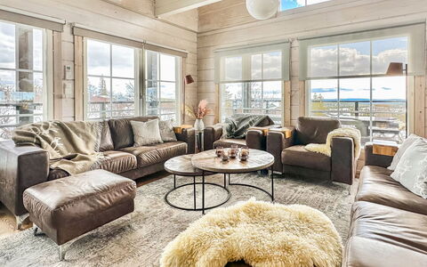 Kontiokota: Wood, Couch, Living Room, Wood Flooring, Ceiling, Hardwood, Lumber, Sofa Bed, Throw Pillow