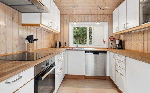 Ellynor - 600M from the Sea: Kitchen, Countertop, Flooring, Wood, Kitchen Appliance, Interior Design, Cabinetry, Floor, Furniture, Major Appliance