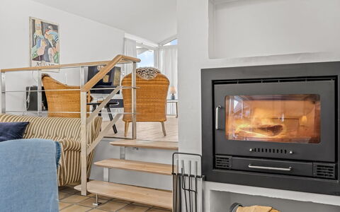 Annrike - 400M from the Sea: Furniture, Flooring, Hearth, Room, Wood Flooring, Living Room, Home Appliance, Wood-Burning Stove, Hardwood, Couch