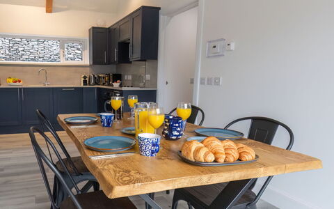 Loch View: Food, Table, Furniture, Tableware, Cabinetry, Chair, Kitchen, Wood, Countertop, Kitchen Appliance