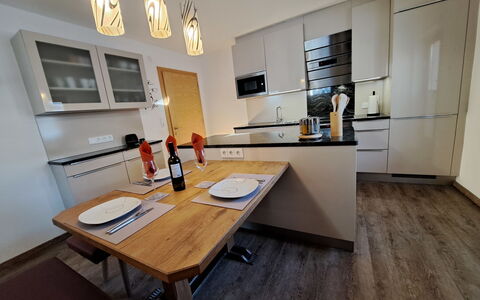 Finkenberg 900: Table, Furniture, Building, Wood, Chair, Picture Frame, Architecture, Interior Design, Cabinetry, Floor