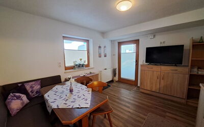 Finkenberg 900: Table, Cabinetry, Furniture, Wood, Interior Design, Lighting, Flooring, Television, Floor, Building