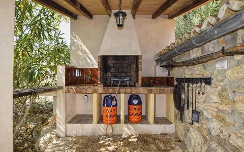 Pla de Ses Rotes: Table, Sky, Furniture, Property, Plant, Chair, Outdoor Table, Outdoor Furniture, Tableware, Building