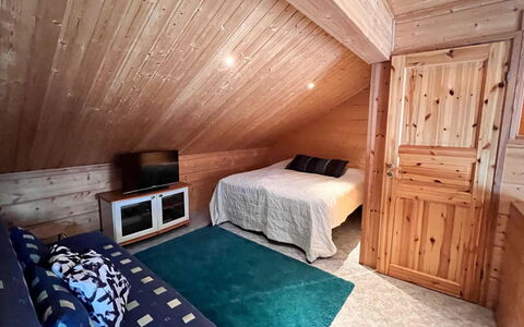 Jytilevi B: Wood, Floor, Bedroom, Ceiling, Flooring, Interior Design, Furniture, Bed, Room, Lighting