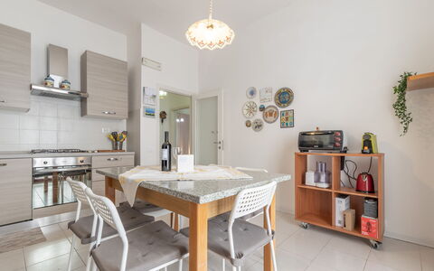 Il Colle Sul Mare Holiday Home: Table, Furniture, Property, Shelf, Wood, Interior Design, Cabinetry, Chair, Shelving, Floor