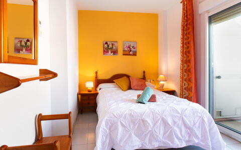 San Luis Playa: Furniture, Interior Design, Floor, Bedroom, Flooring, Wood, Bed, Room, Ceiling, Apartment