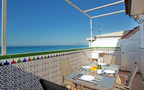 San Luis Playa: Sky, Water, Property, Furniture, Table, Chair, Shade, Outdoor Furniture, Real Estate, Leisure