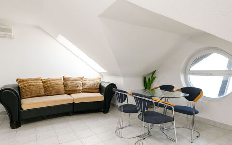 Sandra: Furniture, Couch, Comfort, Table, Building, Plant, Living Room, Flooring, Floor, Wood
