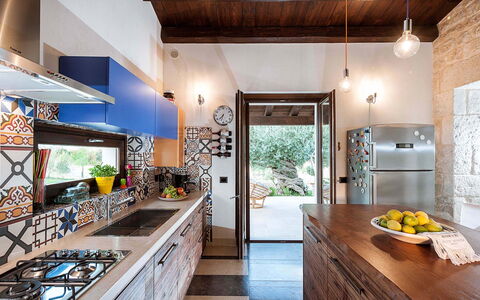 Corte Carrubo - Rosolini, Sicilia: Cabinetry, Countertop, Furniture, Sink, Kitchen, Wood, Interior Design, Lighting, Table, Tap