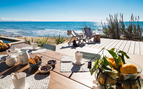 Casa Ninfa - Ispica, Sicilia: Water, Sky, Property, Furniture, Table, Seaside Resort, Building, Tableware, Chair, Outdoor Furniture