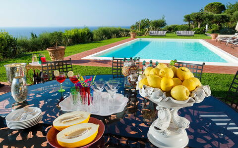 Villa Ester - Capo D'orlando, Sicilia: Plant, Sky, Table, Tableware, Architecture, Tablecloth, Public Space, Tree, Leisure, Decoration