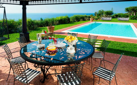 Villa Ester - Capo D'orlando, Sicilia: Furniture, Table, Property, Plant, Chair, Green, Sky, Water, Outdoor Furniture, Flooring